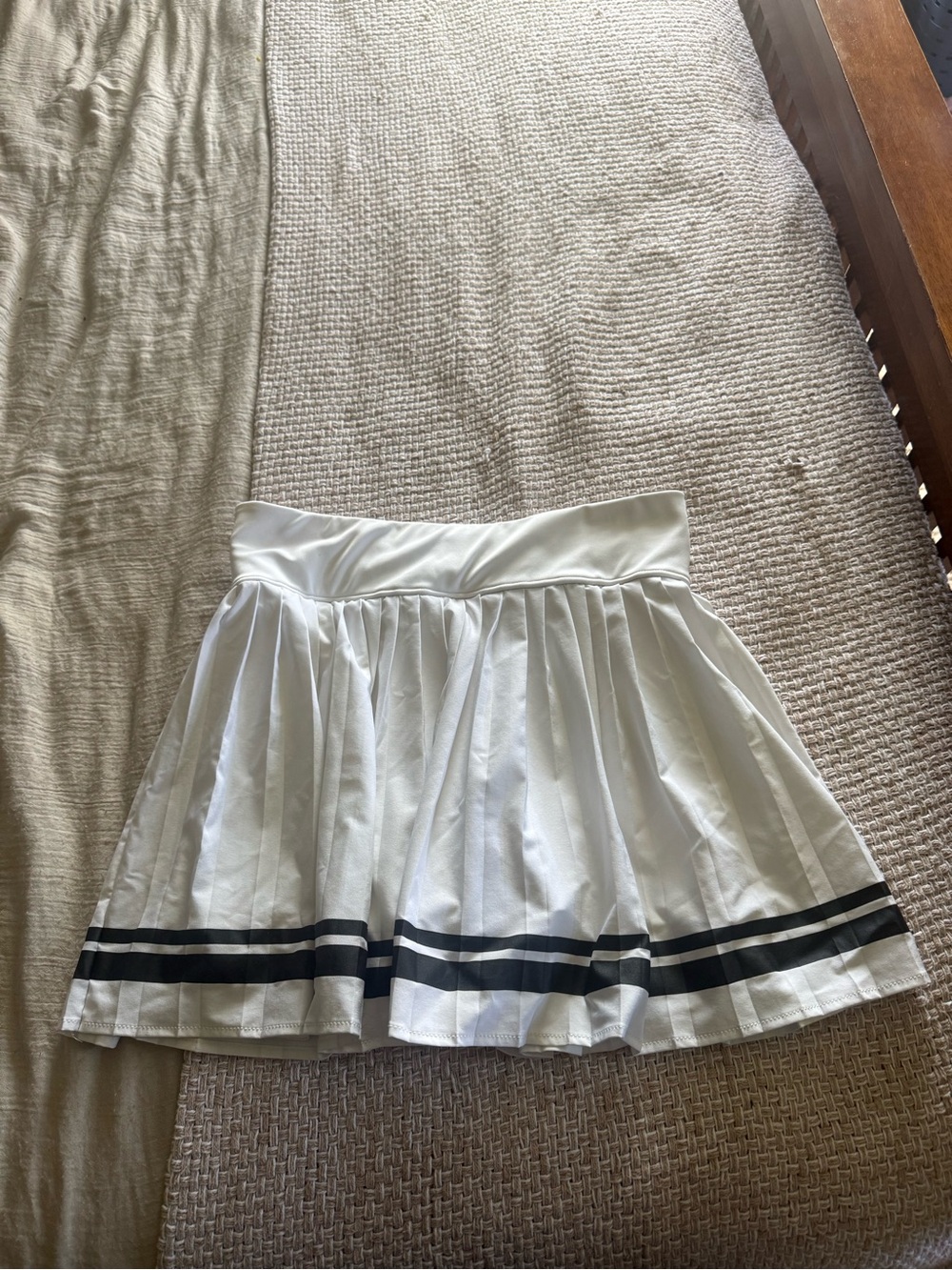 White Pleated Mini Skirt with Black Stripe Trim